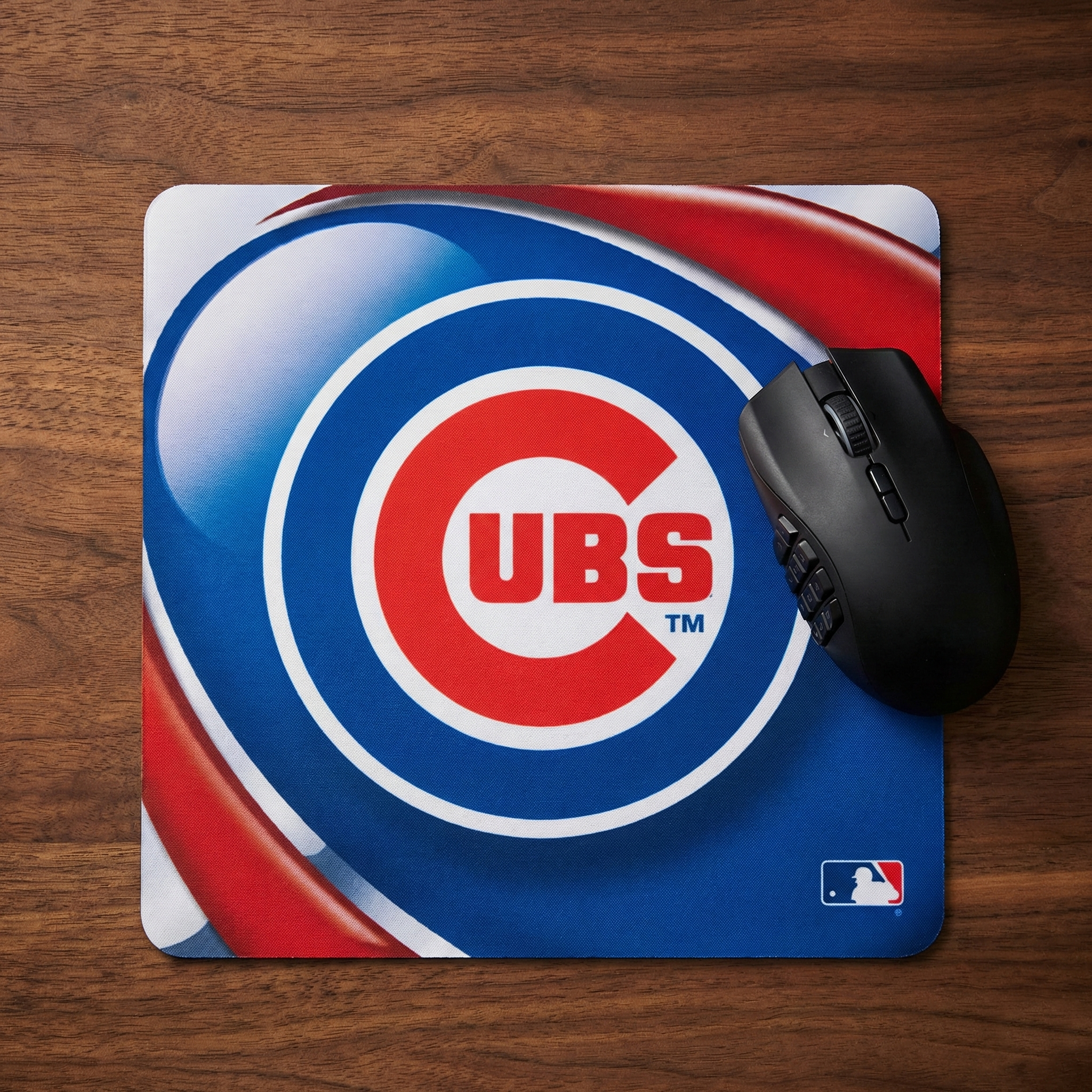 Mouse pad with Chicago Cubs vortex logo on a wooden surface
