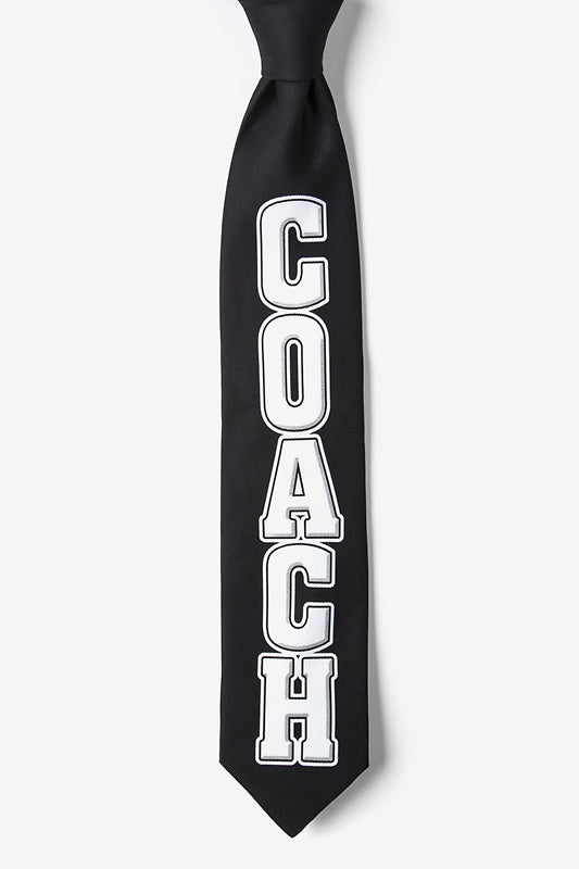 Black tie with 'COACH' printed in white on a white background