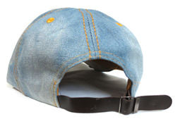 Denim cap with a black strap on a white background