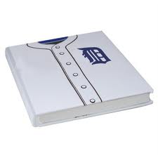 White baseball jersey Detroit Tigers book cover with blue accents and a logo on a white background