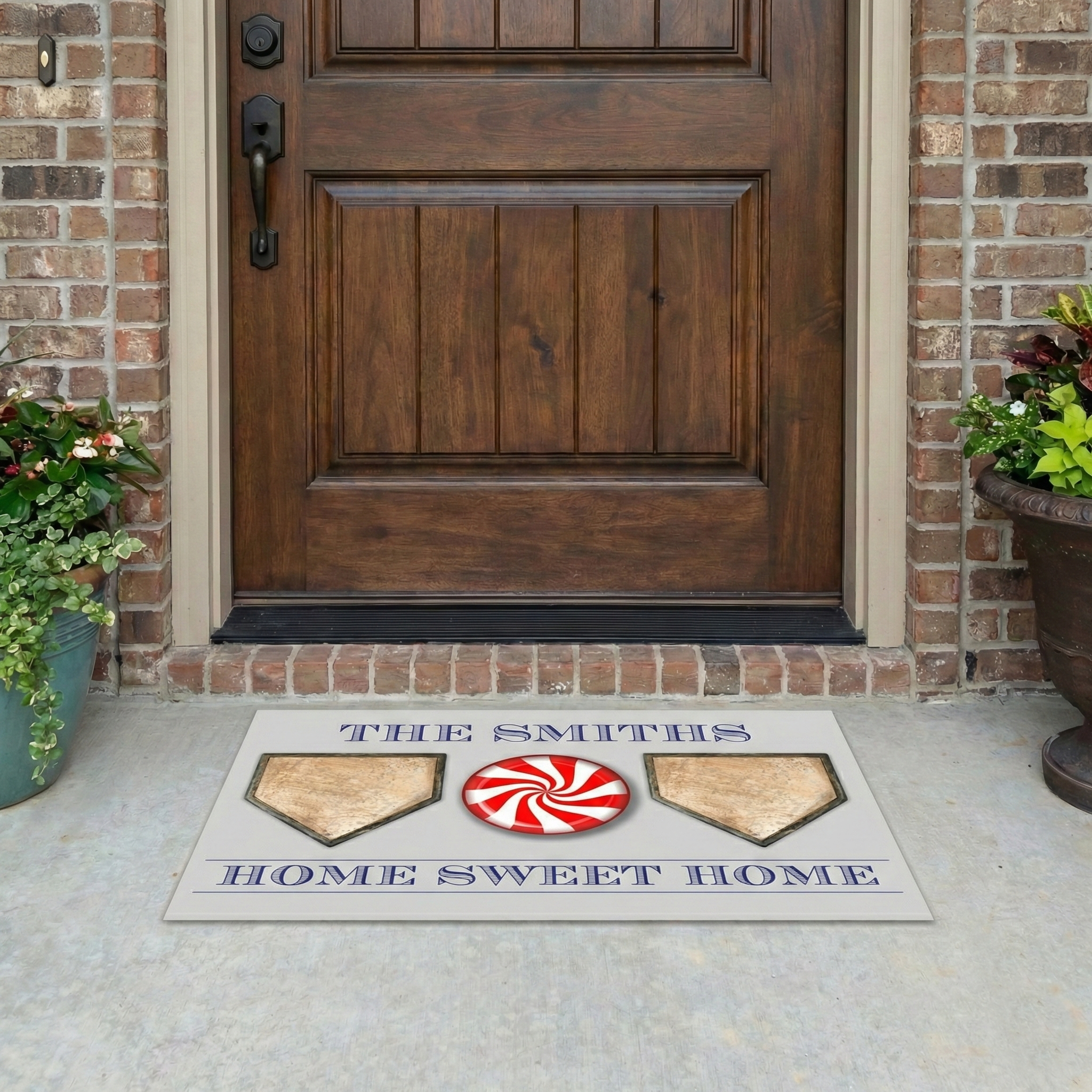 Baseball doormat with 'The Smiths Home Sweet Home' text in front of a wooden door.