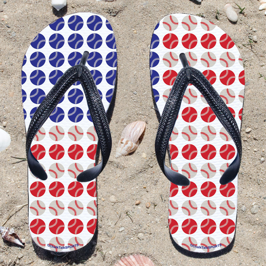 Pair of flip-flops with American flag baseball pattern on a sandy background