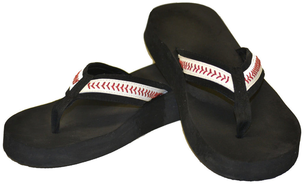Black flip-flops with baseball-themed straps on a white background