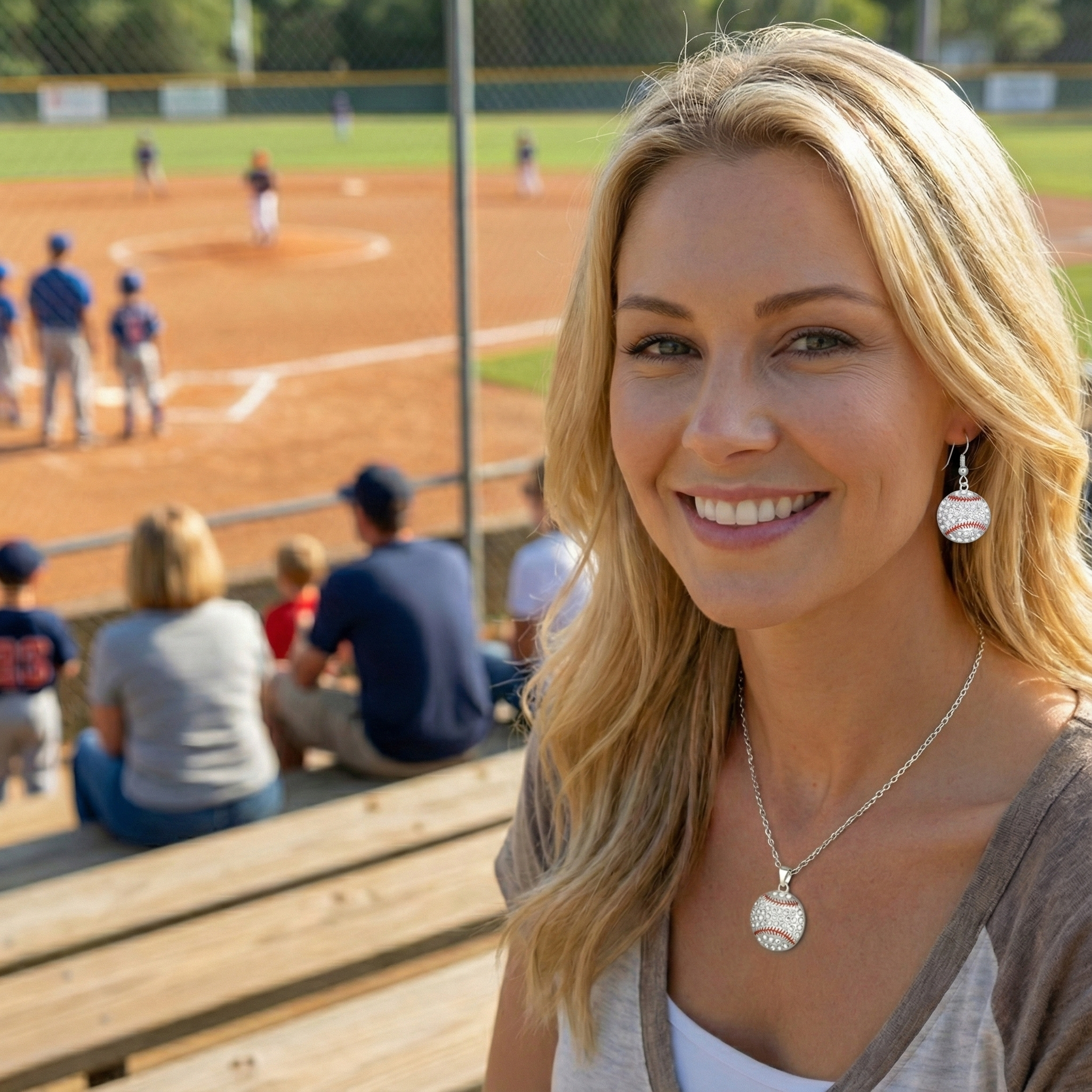 Woman with baseball-themed jewelry crystal necklace and earrings at a baseball game