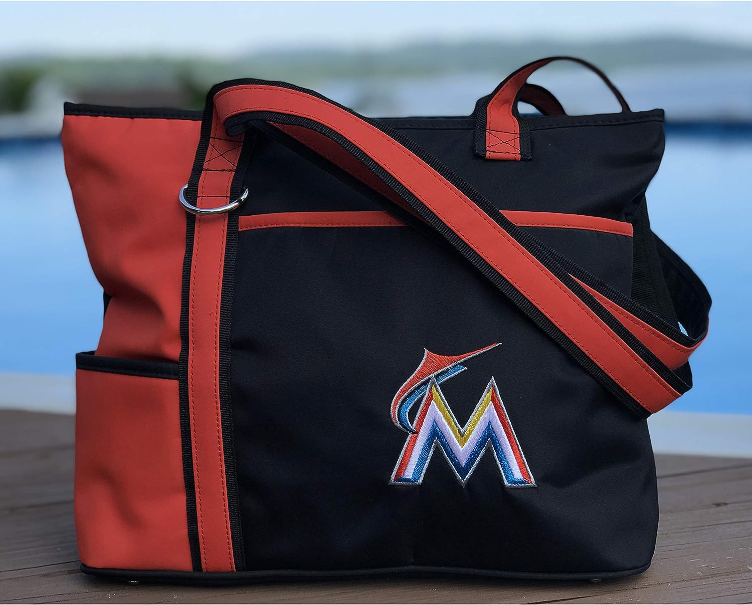 Miami Marlins tote bag with a logo on a wooden surface