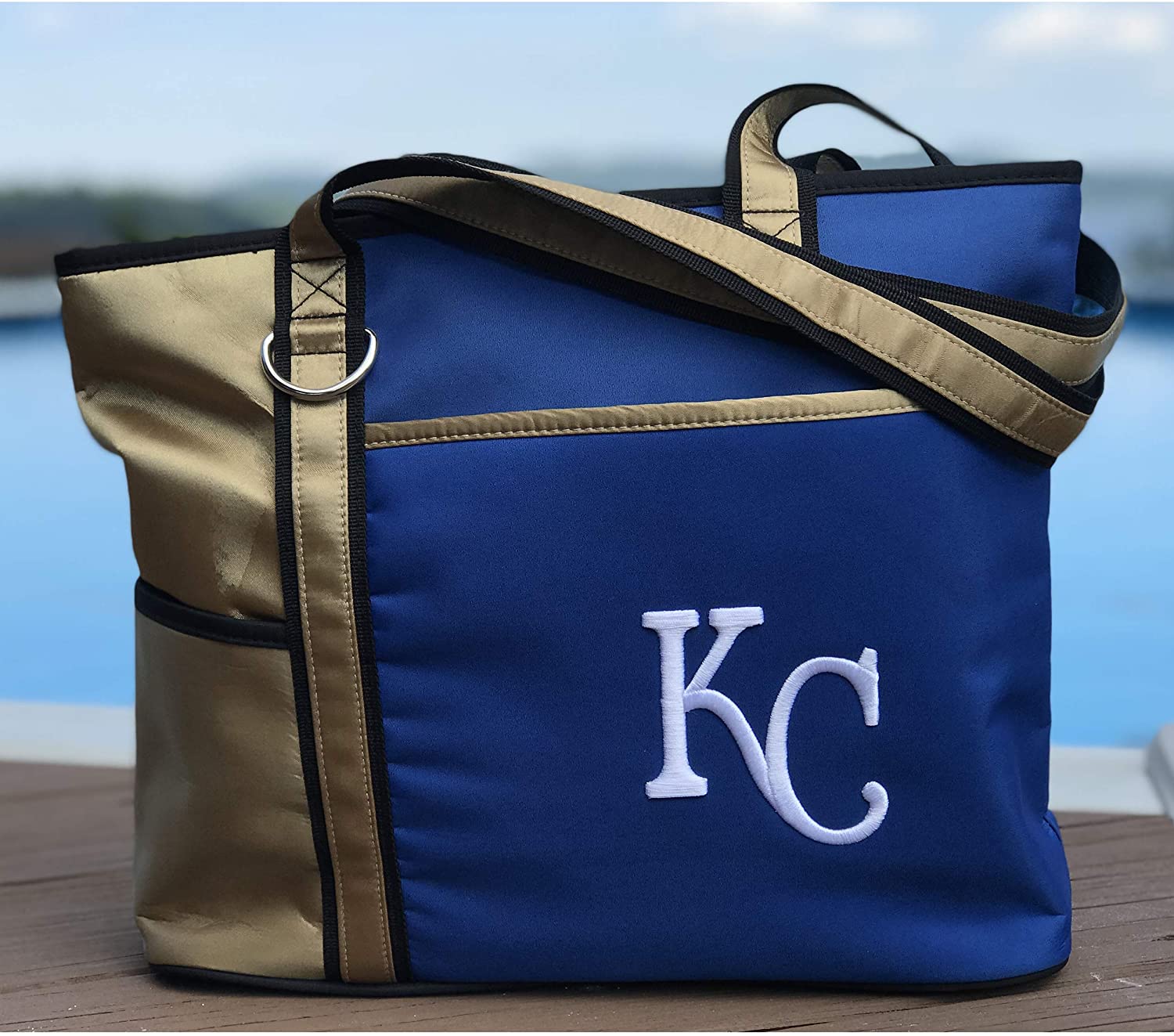 Kansas City Royals tote bag with 'KC' logo on a wooden surface