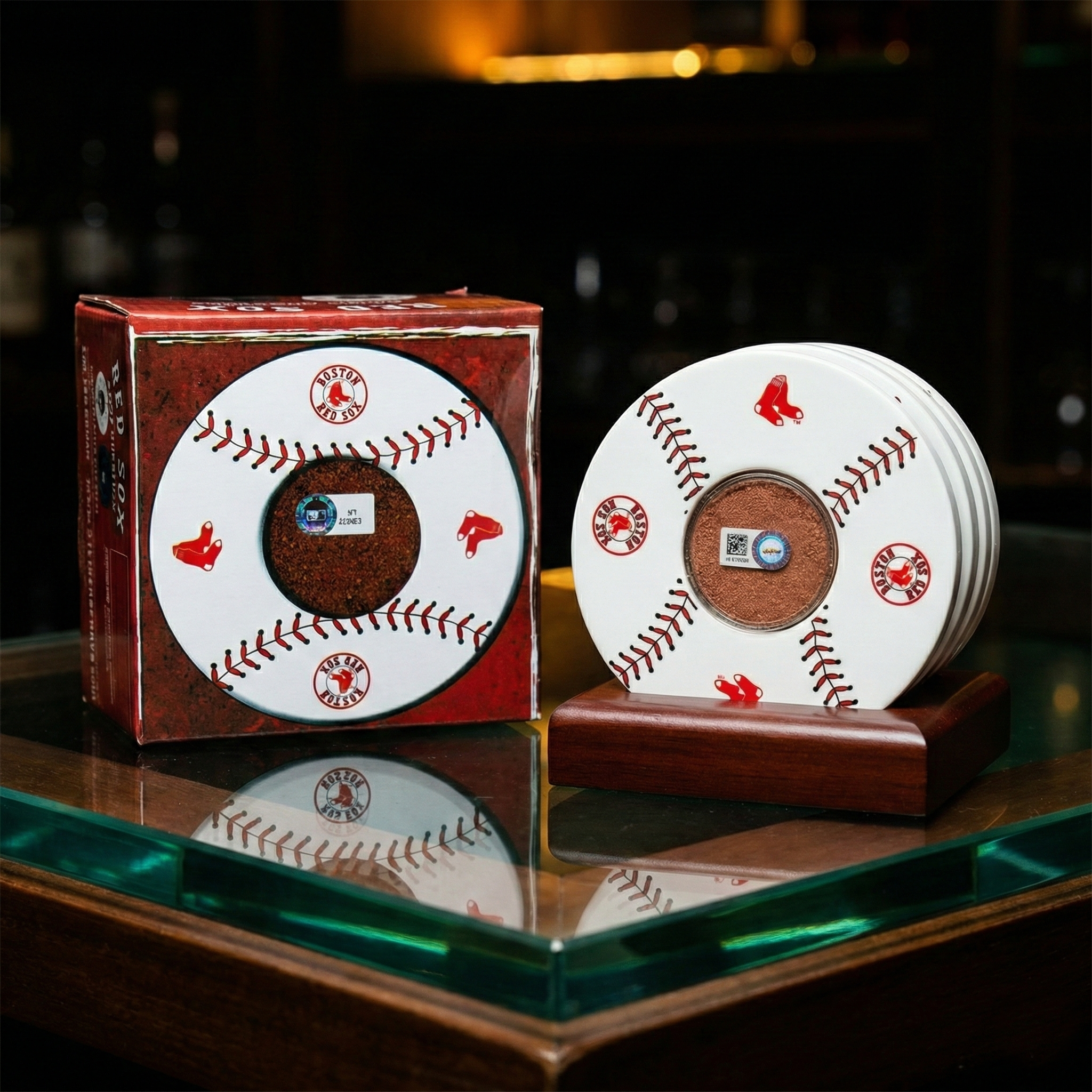 Boston Red Sox game used ceramic coaster set by Steiner on a glass surface, with original box.