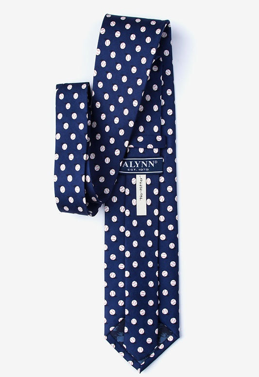 Navy blue tie with white polka dots on a white background
