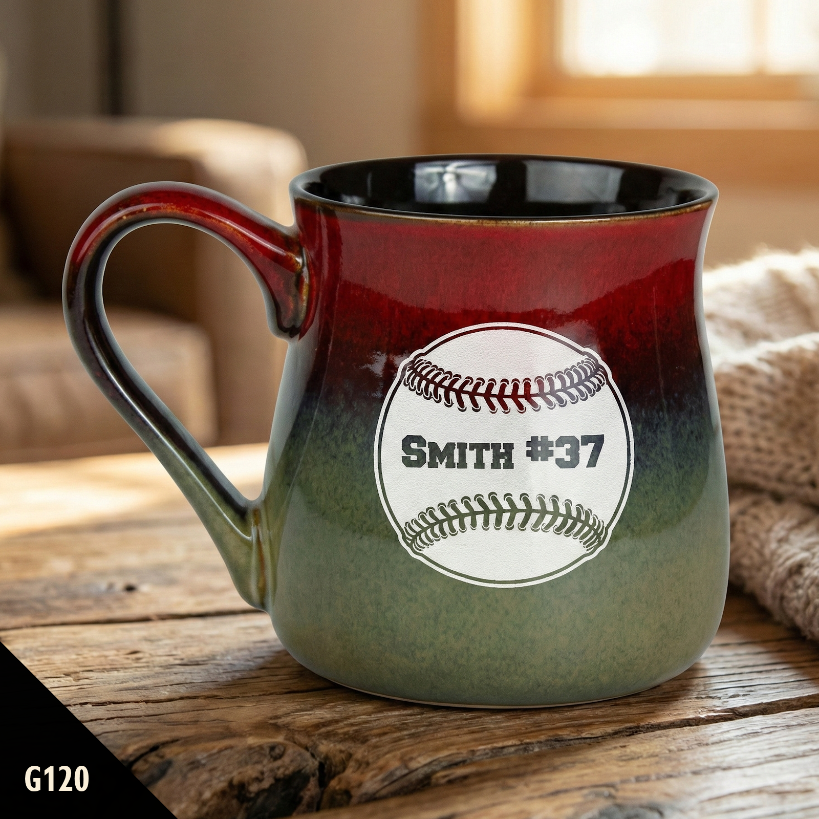 Red and green vintage rustic coffee mug with a baseball design and 'Smith #37' text on a wooden surface.