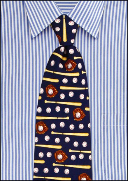 Navy tie with sports-themed pattern on a blue and white striped shirt
