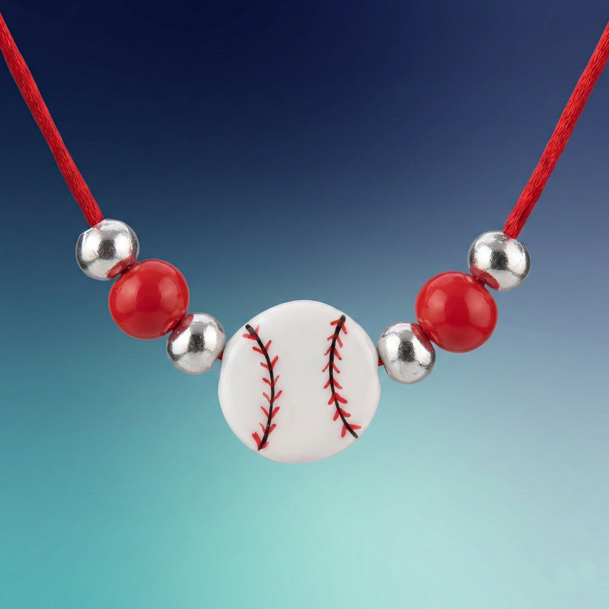 Necklace with a baseball pendant and red and silver beads on a gradient background