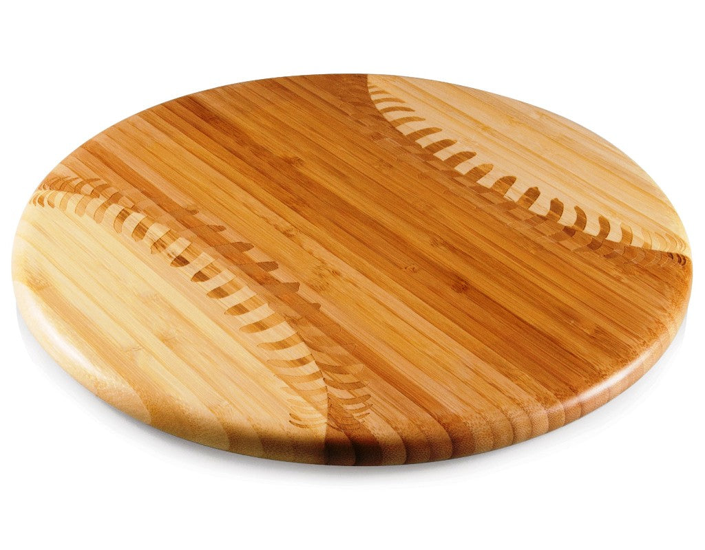 Round wooden baseball cutting board on a white background