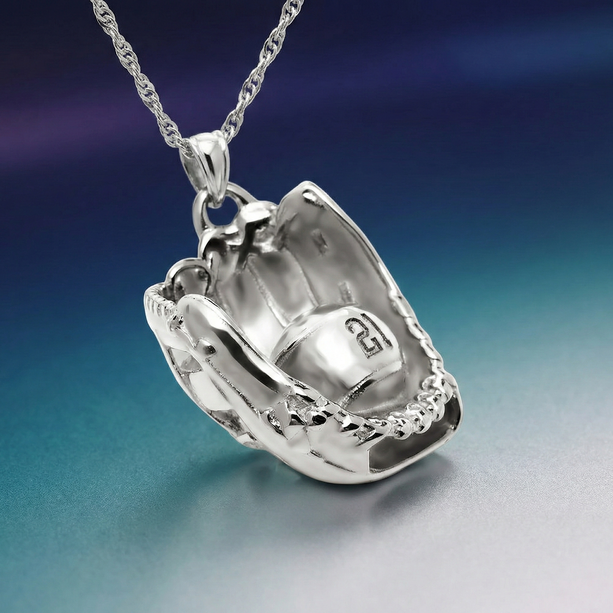 Silver baseball glove engraved number pendant on a chain against a gradient blue background