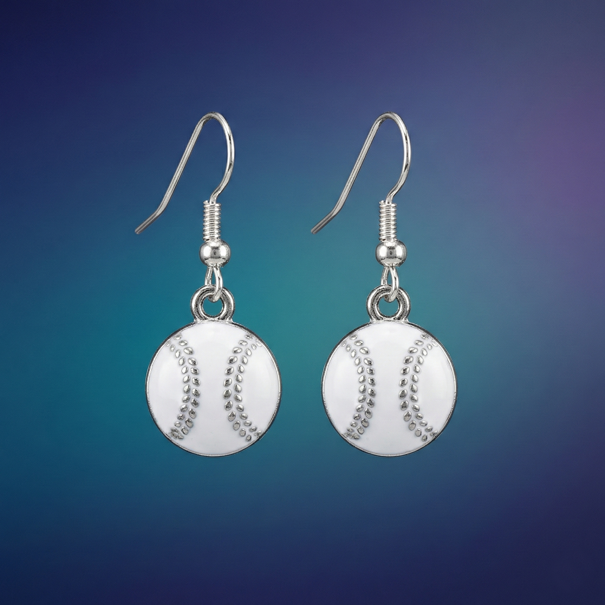 Silver baseball-shaped earrings on a blue gradient background