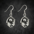 sterling silver baseball glove dangle hook earrings on cool black background.