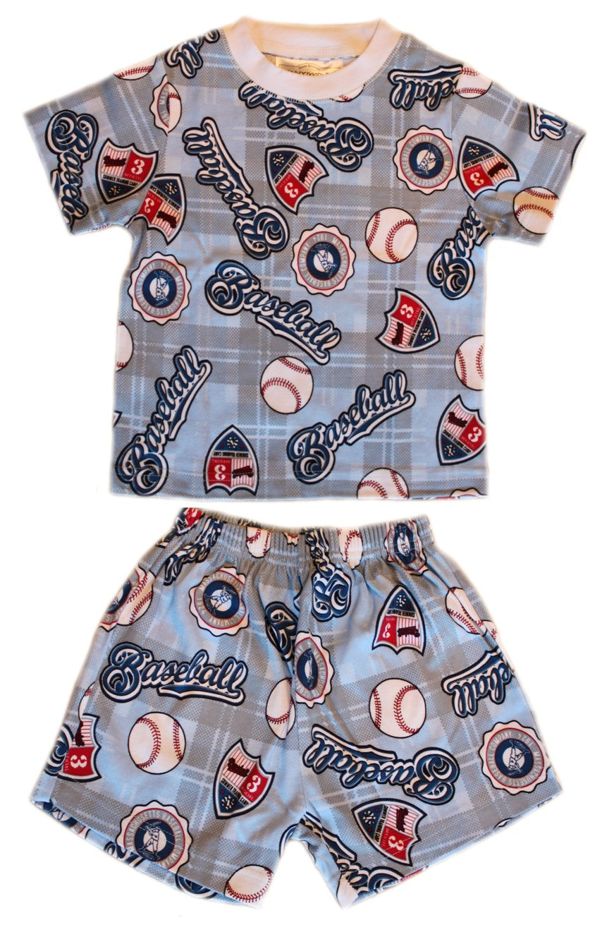 Children's pajama set with baseball-themed design on a white background