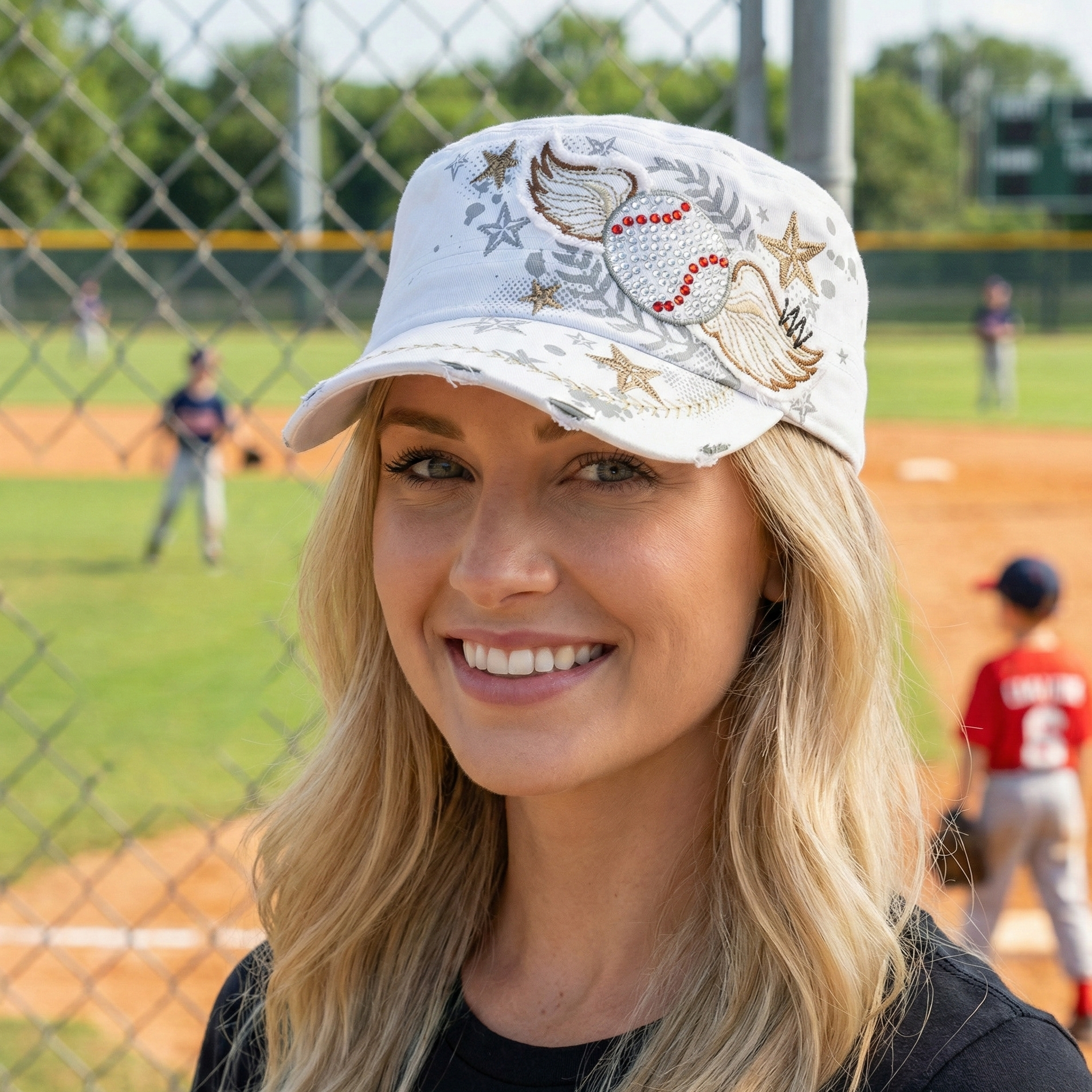Women's vintage wings white baseball hat worn by a pretty woman at the ball field. White baseball cap.