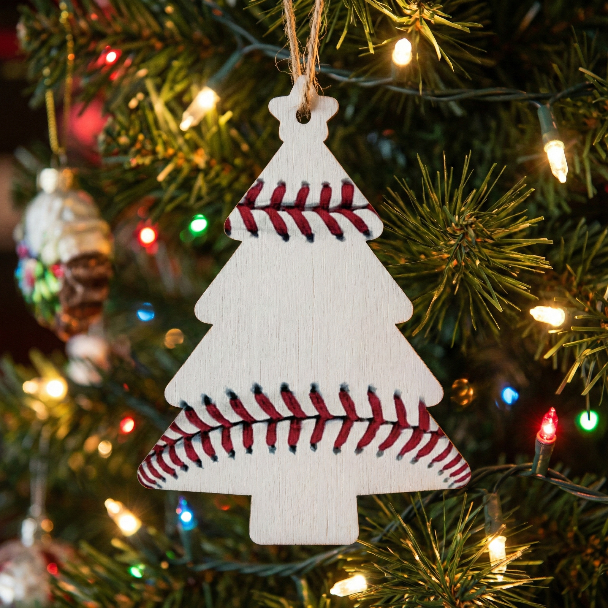 Baseball Wooden Christmas Tree Ornament on a decorated Christmas tree.